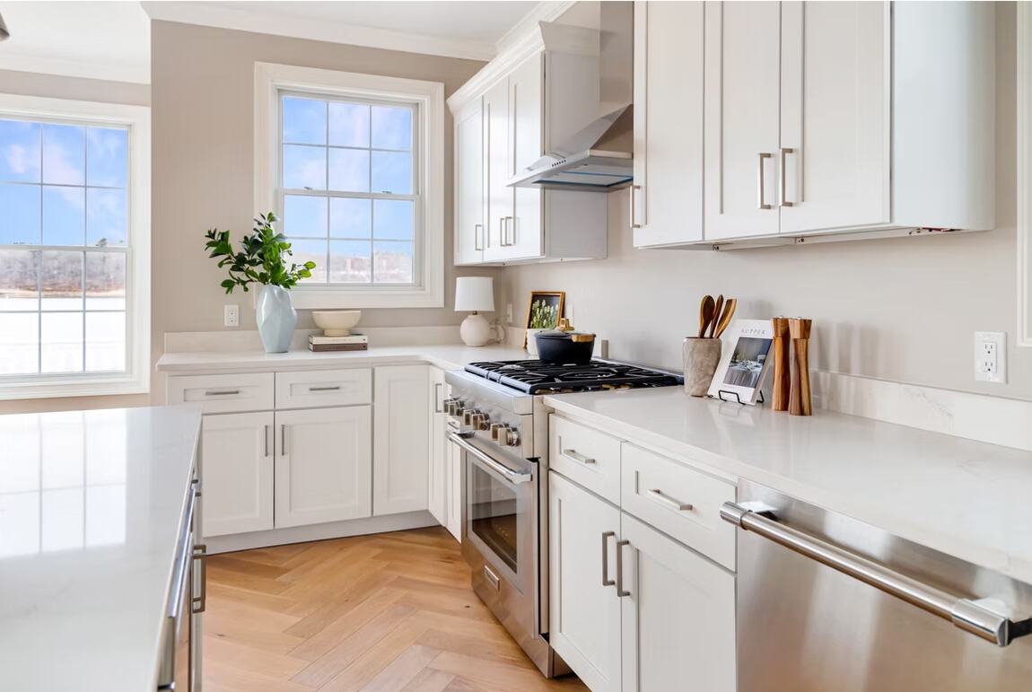 Quartz counters and a full-height backsplash